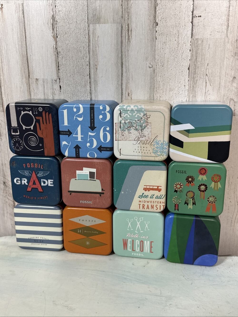 Set Of 12 Empty Fossil Tins - Some With Insert And Book